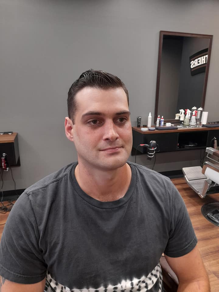 Man With Short Dark Hair Wearing Gray Tie-Dye Shirt — Bolton Brothers Barbers in Erina, NSW