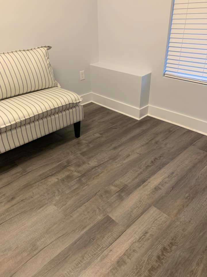 Room with a small  sofa — Louisville, KY — Chuck Cole Flooring LLC