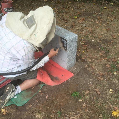 Man Doing Hand Carved Lettering — Bedford Village, NY — CJ Stones