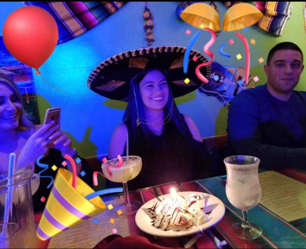 Happy Woman at Bar — Bethpage, NY — Mangoes Mexican Bar & Grill