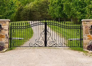 Double wrought-iron gate — Fence and Gate Contractor in Wilmington, DE Double wrought-iron gate — Fence and Gate Contractor in Wilmington, DE