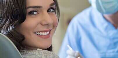 Smiling Woman at Dentist - dentist in Portland, OR