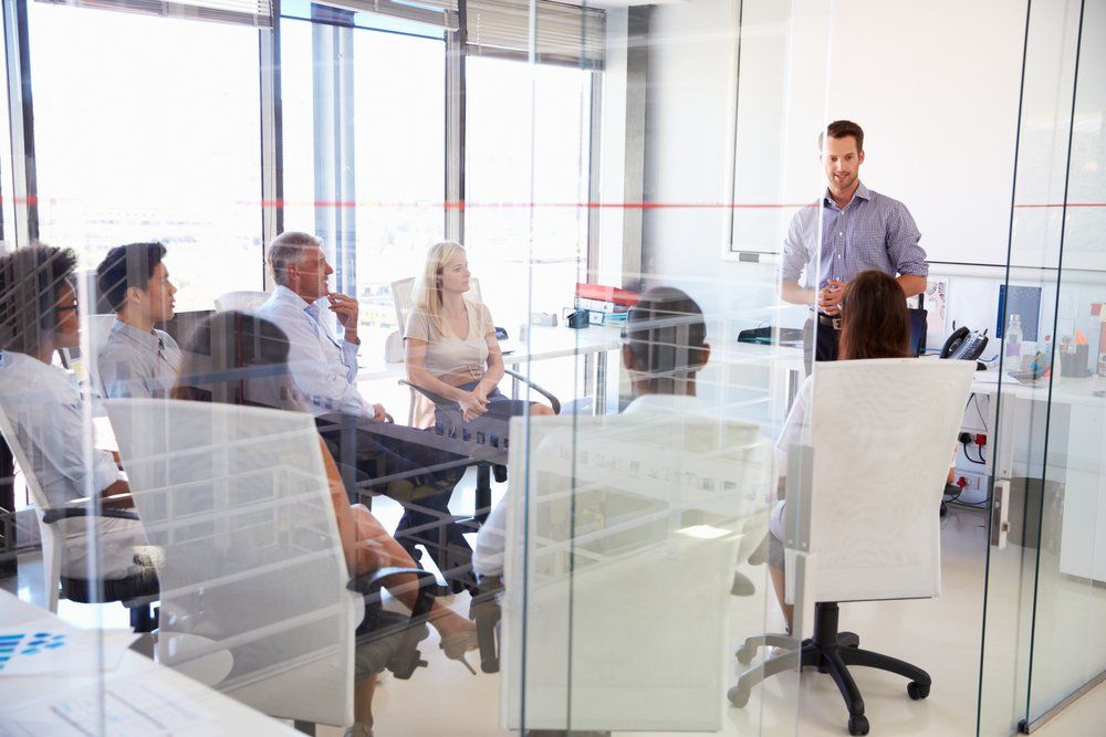 people in meeting room at a training