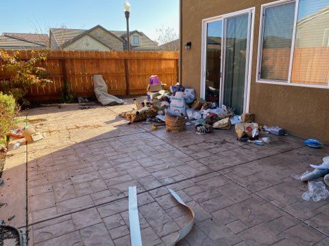 junks beside door | Clovis, CA | Mr. Clean Junk Removal