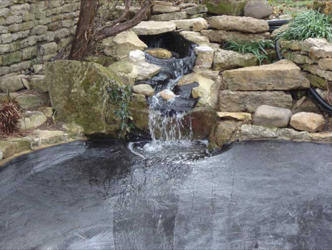pond with waterfall