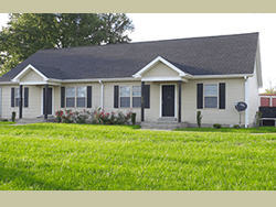 Kentucky Rentals — Purple and White House with a Lawn in Murray, KY