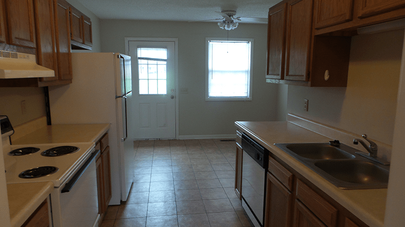 Houses — Dirty Kitchen with Ceiling Fan in Murray, KY