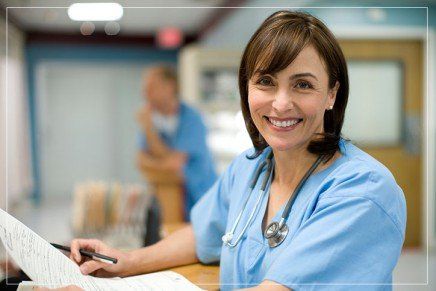 Doctor Holding Records of Patients — Medical Reimbursement in Ocala, FL Doctor Holding Records of Patients — Medical Reimbursement in Ocala, FL