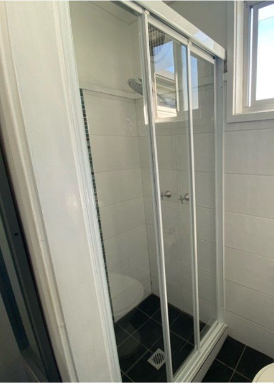 shower with glass doors