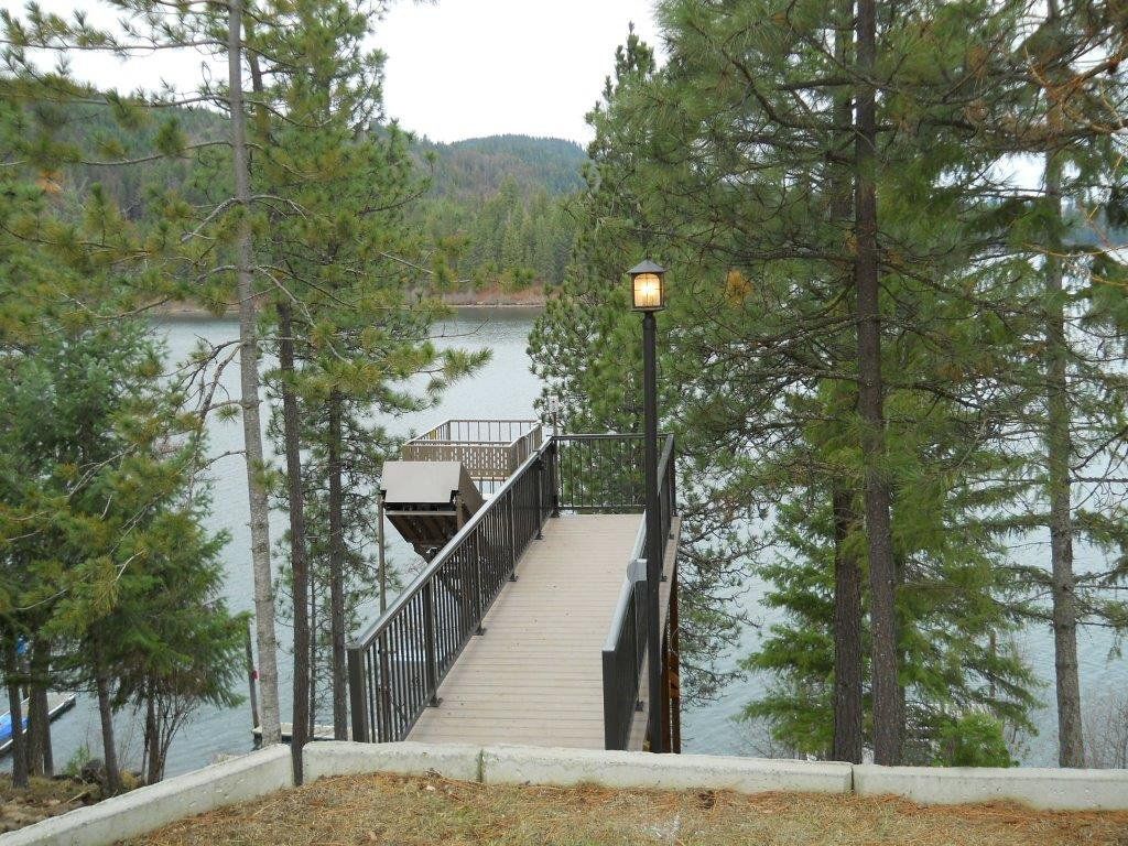 Forest Lake incline hill solution with a hillside tram durable manufactured and installed lakeside to home elevator