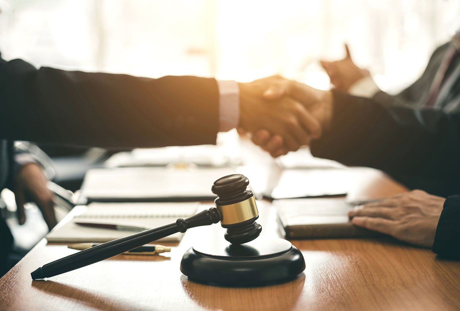 Businessman and Lawyer Shaking Hands to Seal a Deal β Winter Haven, FL β Straughn & Turner, P.A.