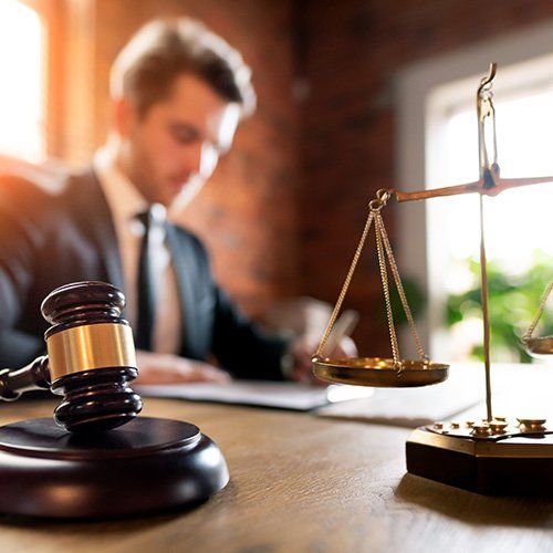 Lawyer Working in Office — Winter Haven, FL — Straughn & Turner, P.A. Lawyer Working in Office — Winter Haven, FL — Straughn & Turner, P.A.