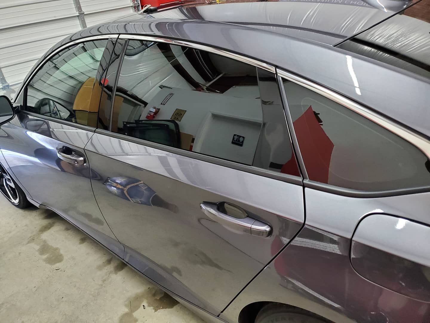 Black Sedan with New Windows — Converse, TX — Quality Master Auto Glass