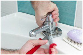Leaking tap? Call me A plumber fixing a tap
