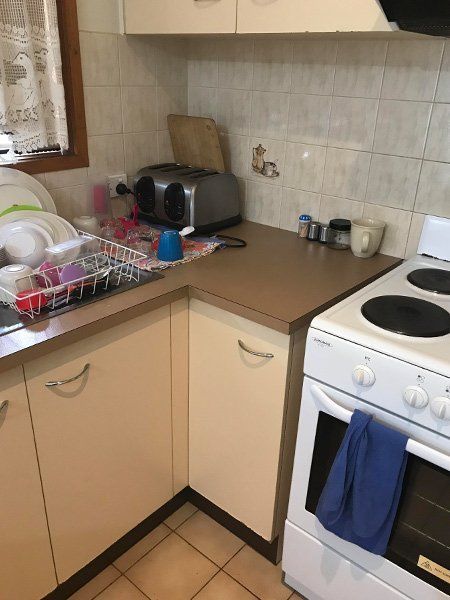 before dated kitchen is renovated