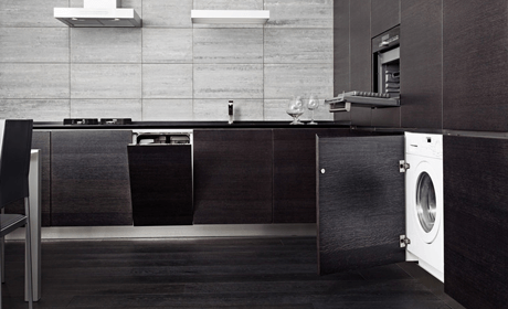 a stunning kitchen area with a new washing machine fitted