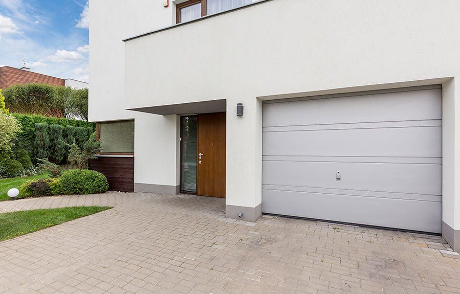 white garage door on home