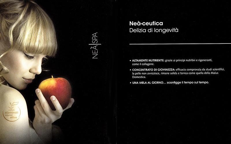 Donna con una mela in mano, pubblicità Nea Spa con la scritta