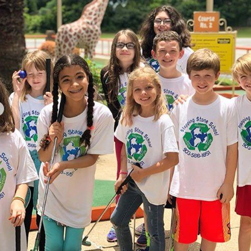 Kids Wearing White Shirt Smiling — Tyler, TX — Stepping Stone School Kids Wearing White Shirt Smiling — Tyler, TX — Stepping Stone School