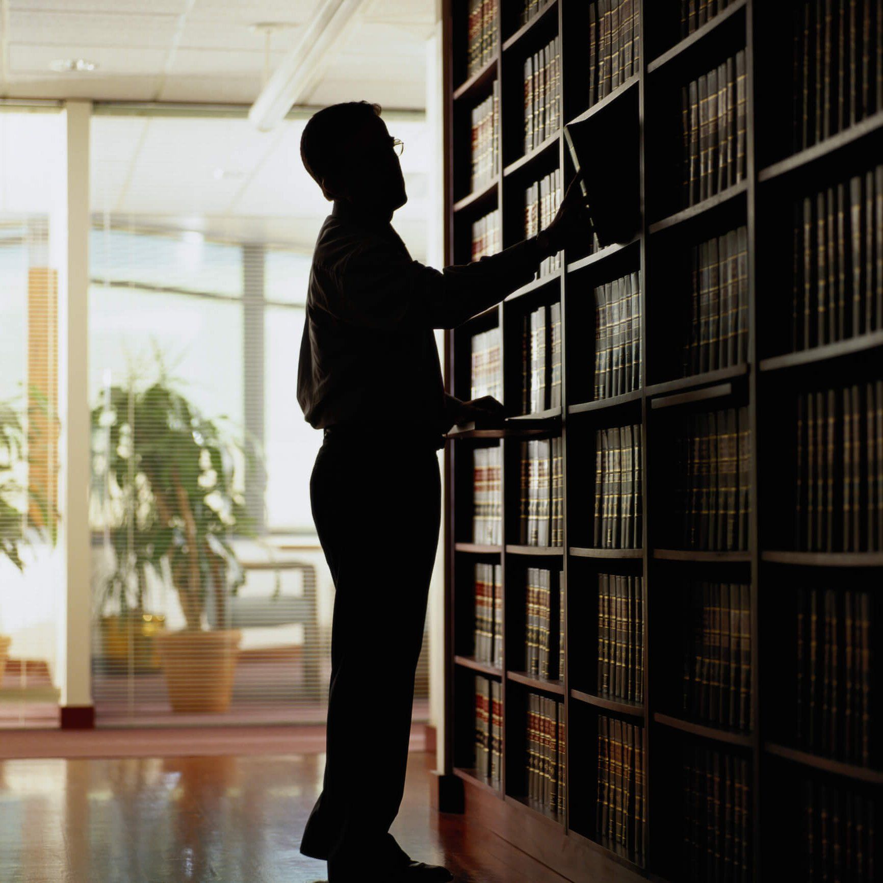 Silhouette of Lawyer in a Law Library — Lawyer in Clarksburg, WV Silhouette of Lawyer in a Law Library — Lawyer in Clarksburg, WV