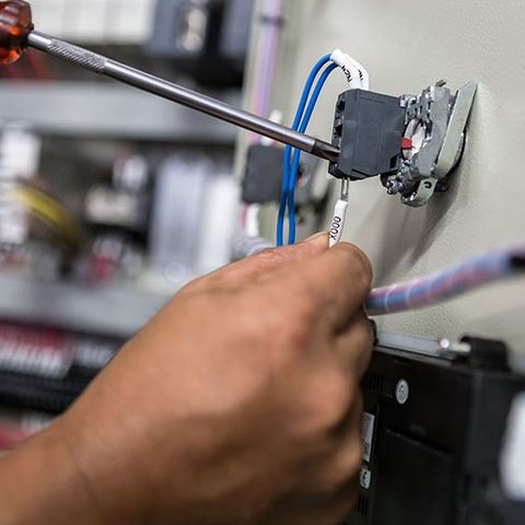 Outdoor Lighting — Man Fixing Wiring in Horsham, PA Outdoor Lighting — Man Fixing Wiring in Horsham, PA