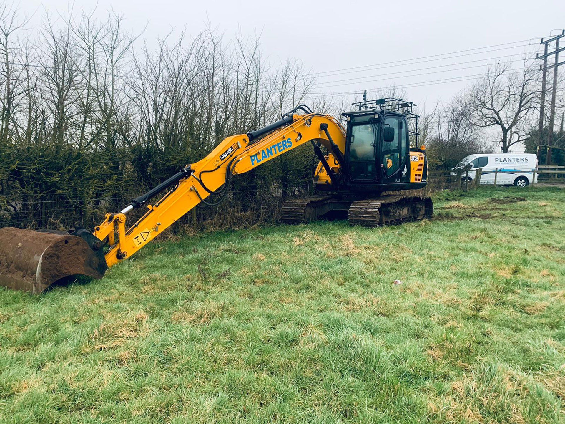 digger in a field