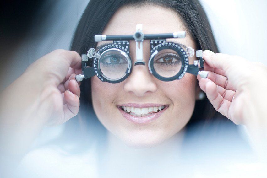 a lady getting her eyes tested