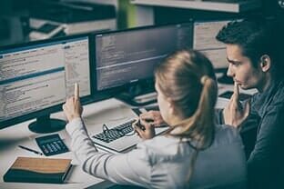 Couple Using Computer — Computer Builds in Fairfield, ME