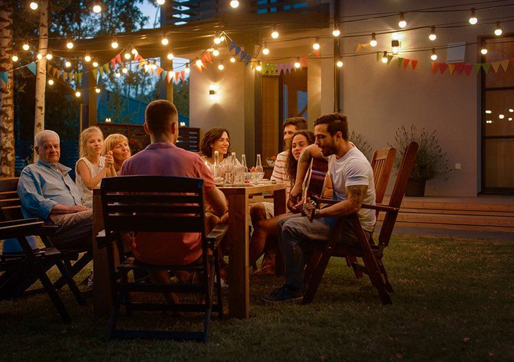 Family enjoying new deck design
