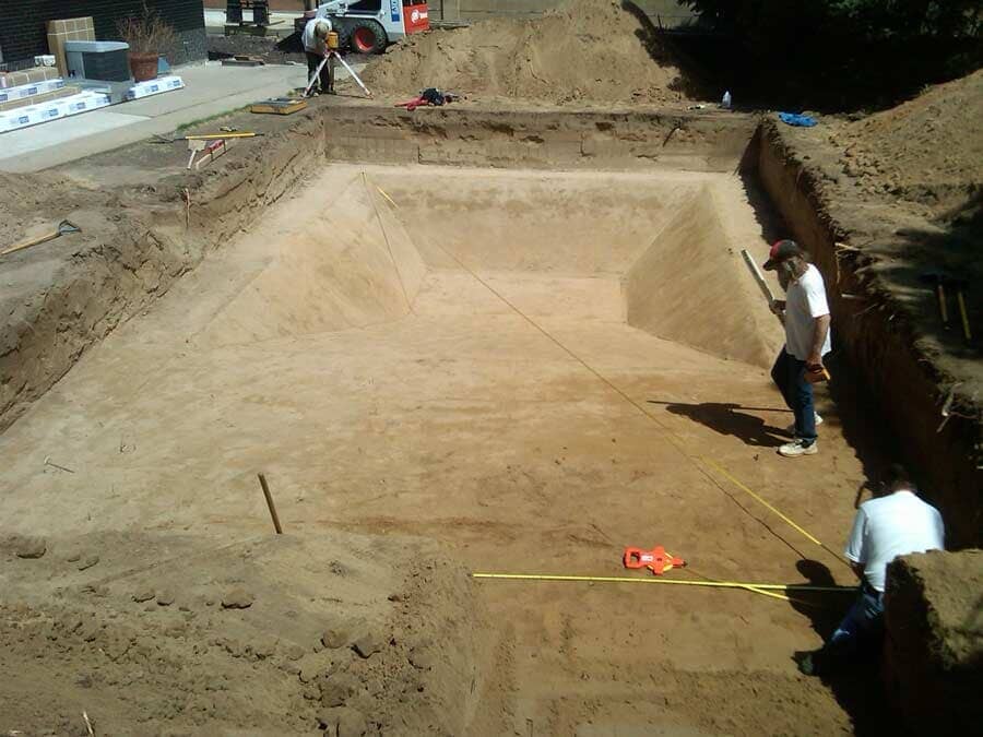 Worker with measure tape - Excavation in Lamar, CO