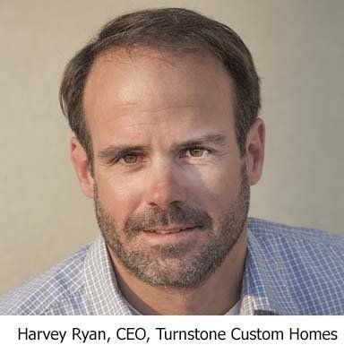Harvey Ryan, CEO of Turnstone Custom Homes, smiling, wearing a blue plaid shirt.