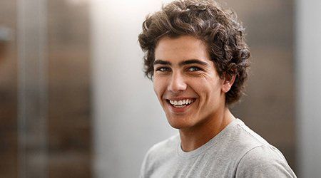 Dental Treatment — Man Smiling in Cleveland, OH Dental Treatment — Man Smiling in Cleveland, OH
