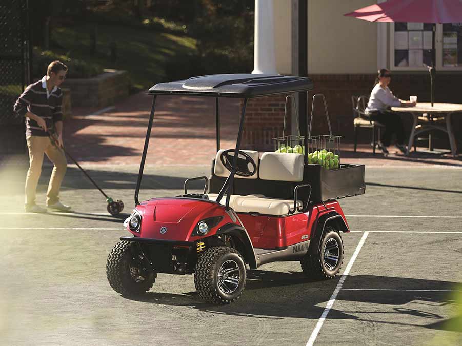Golf Cart Styles — Large Red Golf Cart On The Road in Reno, NV