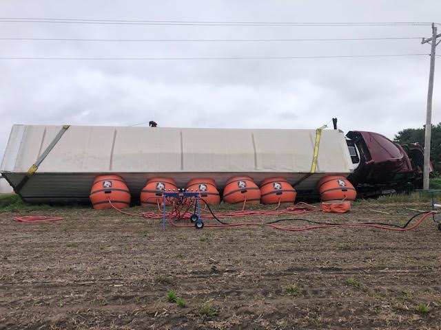 Trailer Truck Recovery with Air Cushion — Cedar Falls, IA — Rasmusson Towing Trailer Truck Recovery with Air Cushion — Cedar Falls, IA — Rasmusson Towing