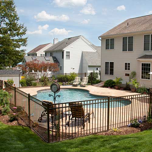 Pool Surrounded By Steel Fences — Stockton, CA  — Stockton Fence & Material