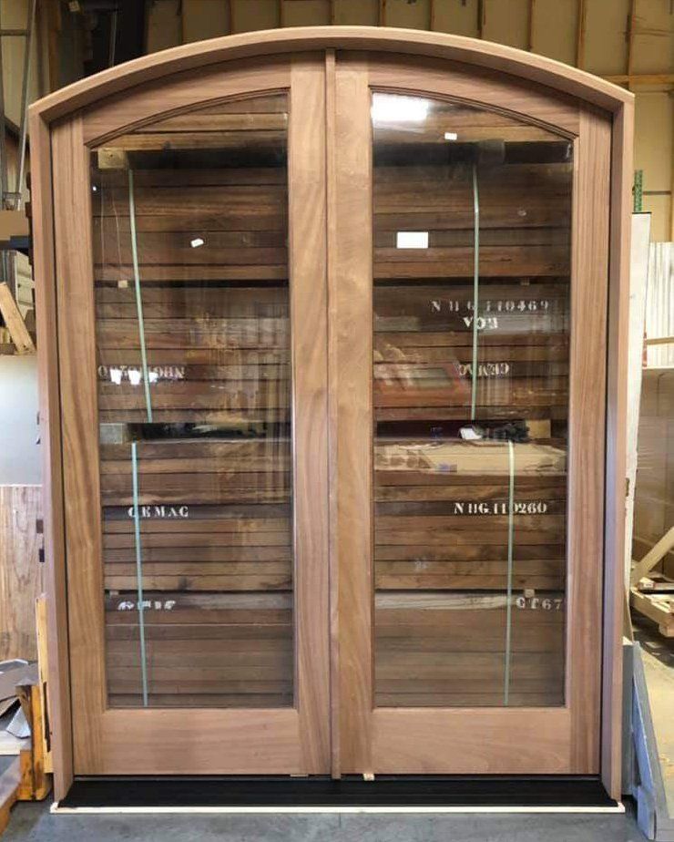 Arched double doors with full lites