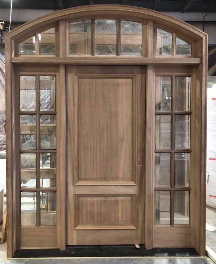 Mahogany solid wood door with sidelights and arched transom