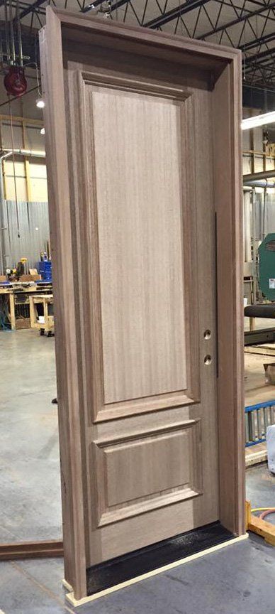 Solid wood two panel prehung exterior door