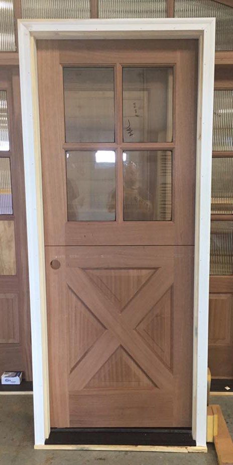 exterior door with 4 glass panes and cross buck