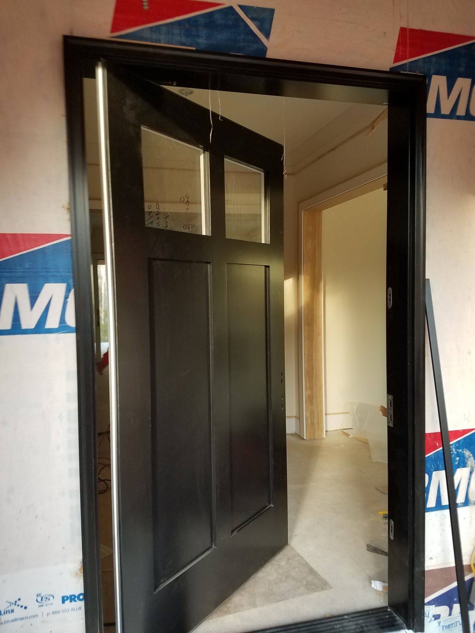 Solid wood rustic double door with arched top and speak easy