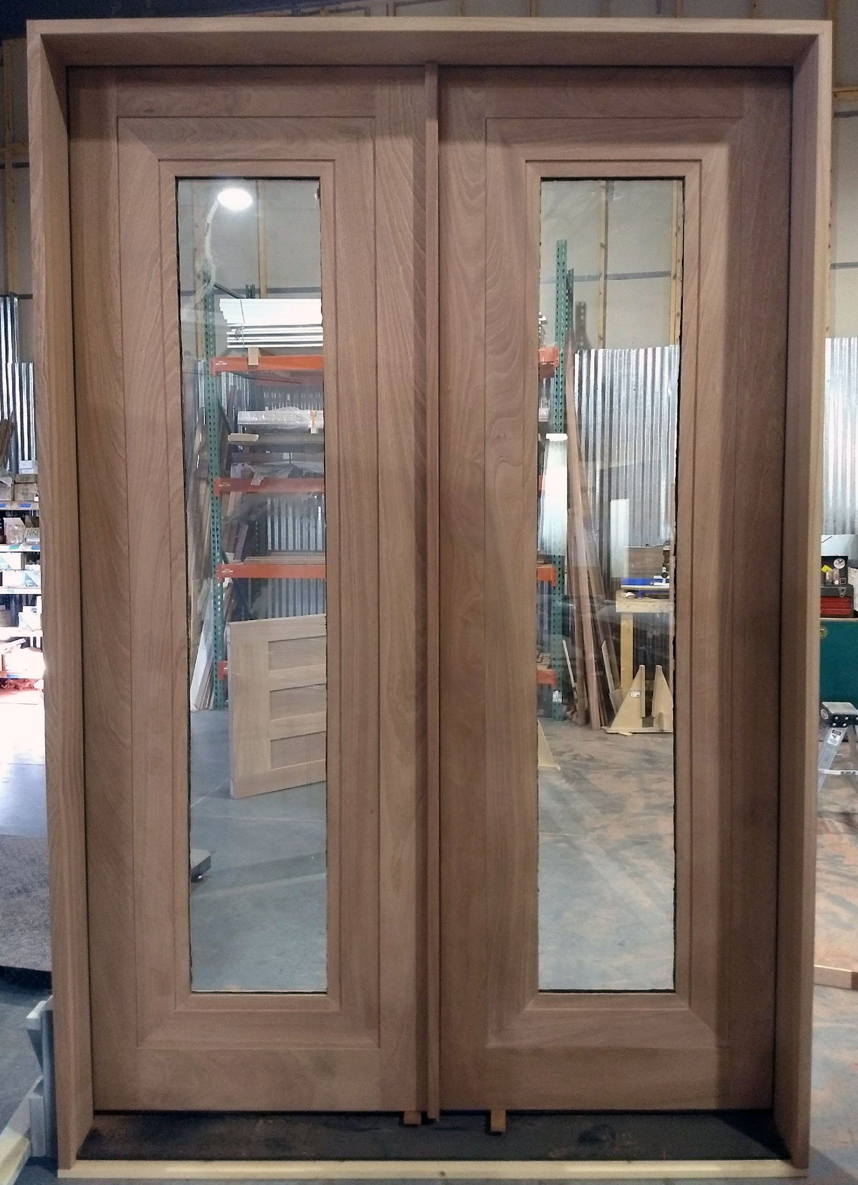 Full-lite double entry doors made out of sapele mahogany