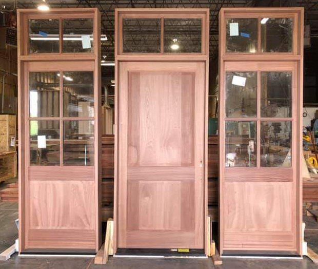 Solid mahogany Hurricane rated entry door unit with impact glass
