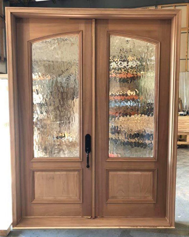 Half glass and half wood panel double exterior door