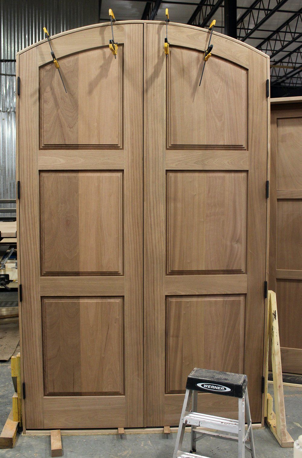 Triple step panel mahogany double door unit.