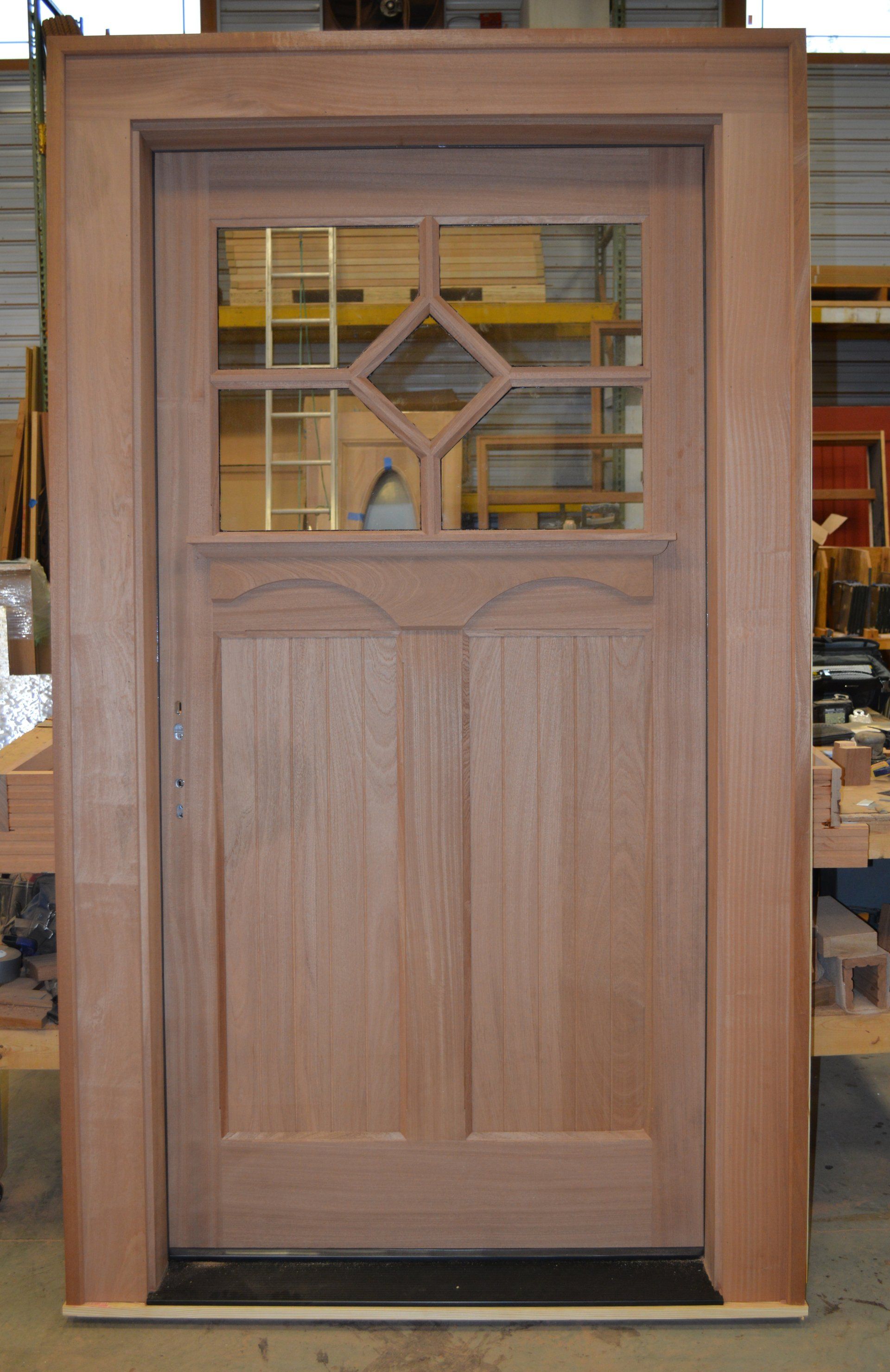 Unique third lite craftsman door with diamond TDL and dentil shelf