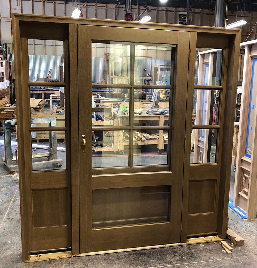 Traditional 6 lite Rift Sawn White Oak wood door with storm door