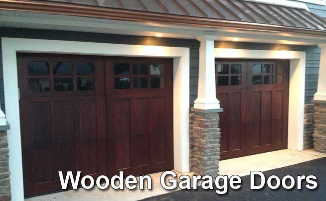 A pair of wooden garage doors on a house