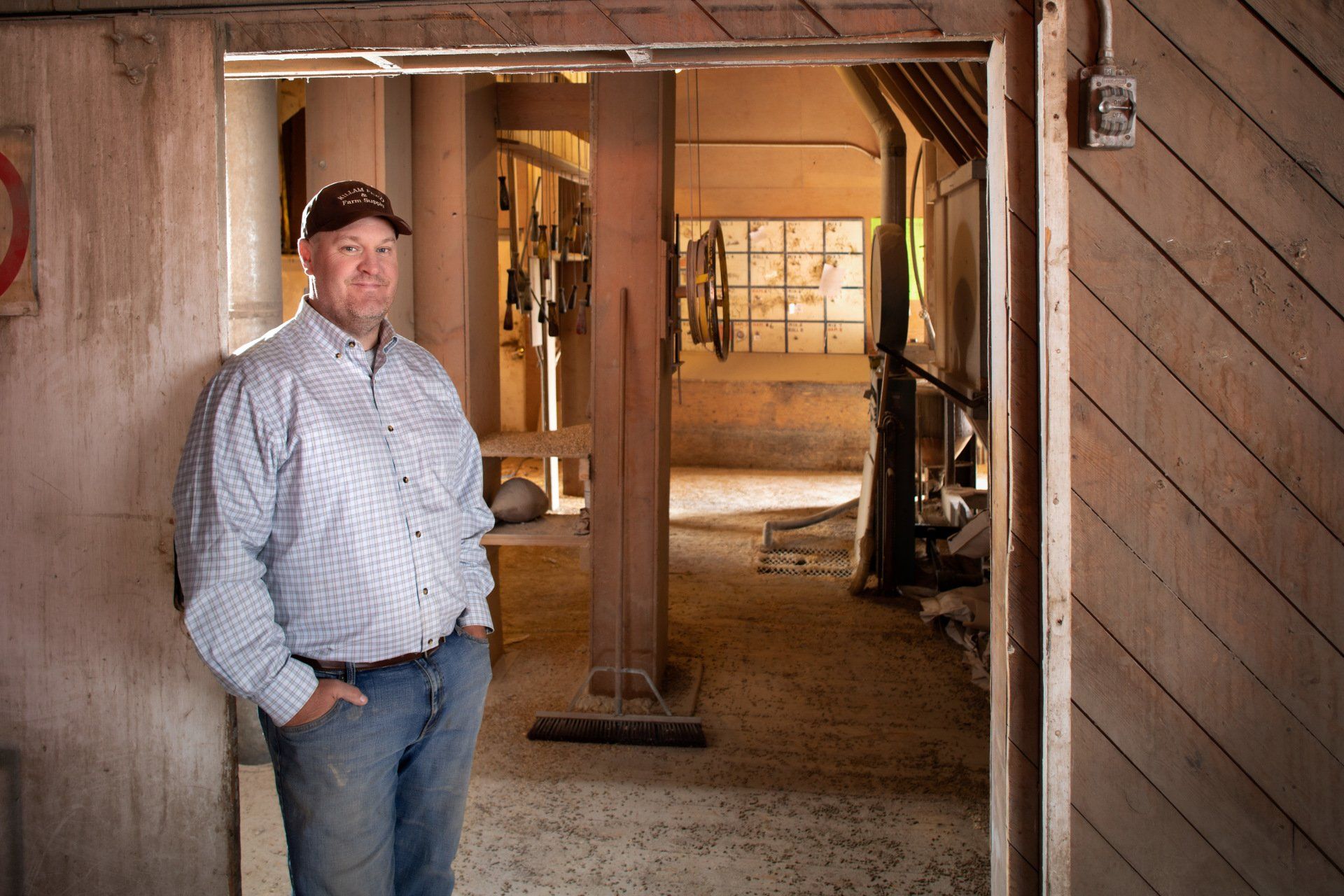 PROFESSIONAL PHOTOGRAPHY  FEATURING RURAL ALBERTA FARMER FOR VISION CREDIT UNION BY IVY DESIGN INC