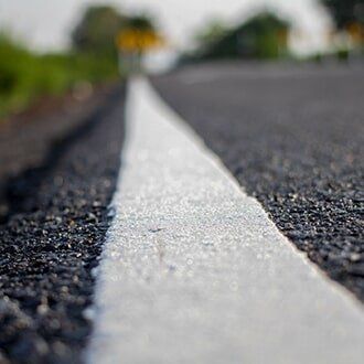 Asphalt Country Road And White Line — Driveways in Arnold, MO Asphalt Country Road And White Line — Driveways in Arnold, MO