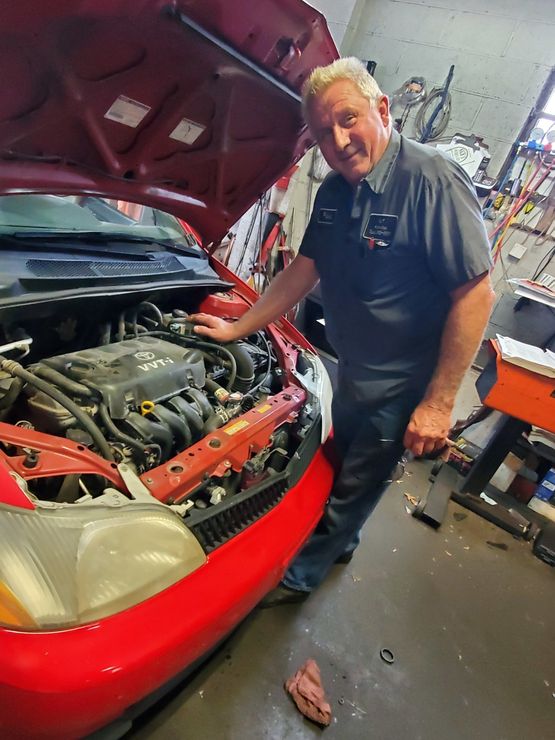 A professional doing a car inspection in High Point, NC